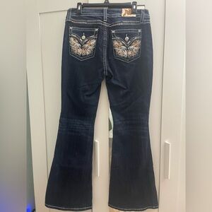 Miss Me Dark Blue Flare Jeans with Embroidery back pockets from BUCKLE Sz. 31